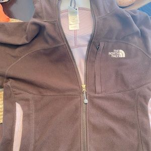 Woman’s full zip North Face jacket